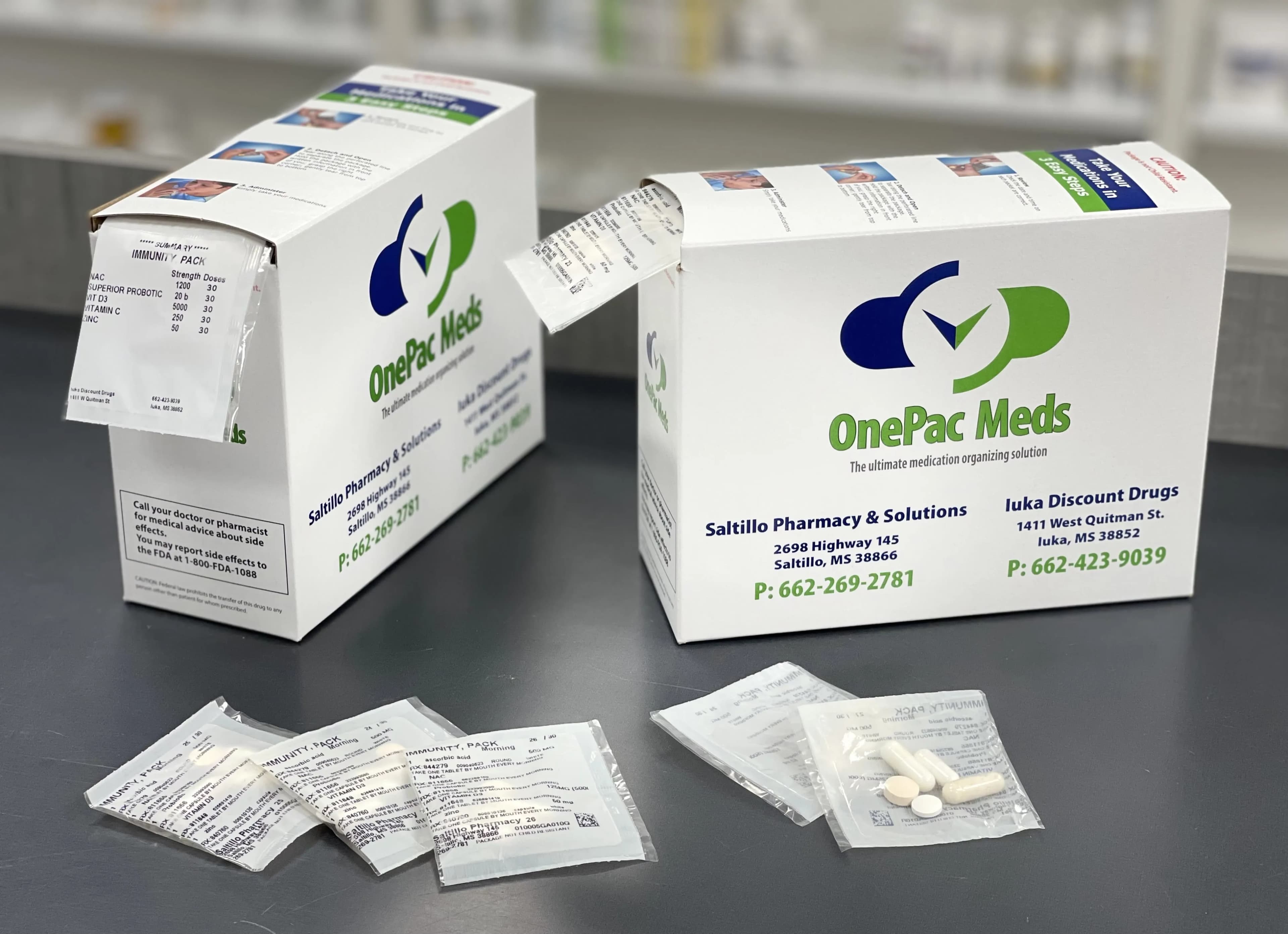 OnePac Meds multi-dose medication packets on the pharmacy counter